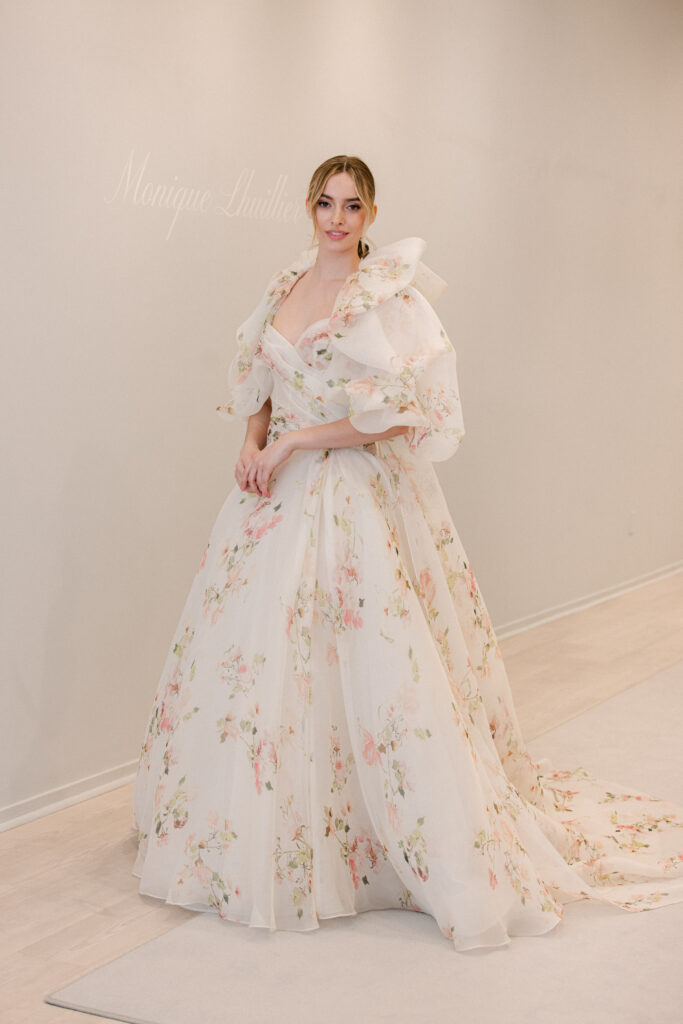 Monique Lhuillier designer bridal fashion 2024 floral wedding dress wedding dress with sleeves wedding dress with cape NYFW