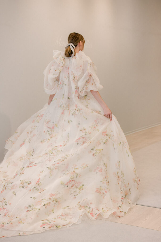 Monique Lhuillier designer bridal fashion 2024 floral wedding dress wedding dress with sleeves wedding dress with cape NYFW