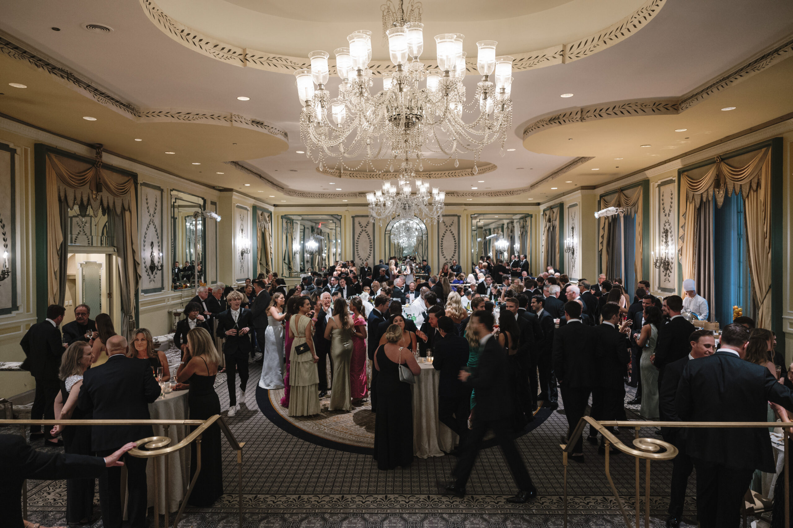 Guests gather in an elegant ballroom for cocktail hour. best wedding photographers in Connecticut
best wedding photographers in New York city
best wedding photographers in tri-state area
Connecticut wedding photographer
Connecticut wedding planning
getaway wedding photographer
Litchfield county wedding photographer
Manhattan wedding planning
New York wedding photographer
travel wedding photographer
wedding day schedule
wedding day schedule template
wedding day timeline
wedding planning tips
wedding schedule template
when to start getting ready on my wedding day