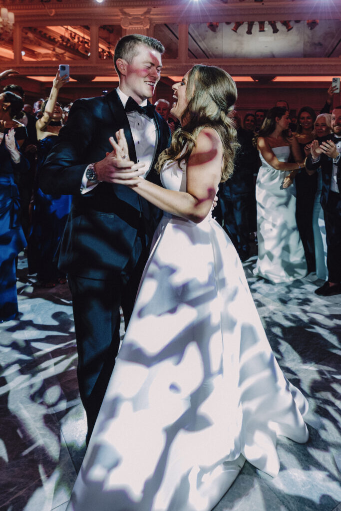 A bride and groom dance under artistic lighting as they smile and laughter together. best wedding photographers in Connecticut
best wedding photographers in New York city
best wedding photographers in tri-state area
Connecticut wedding photographer
Connecticut wedding planning
getaway wedding photographer
Litchfield county wedding photographer
Manhattan wedding planning
New York wedding photographer
travel wedding photographer
wedding day schedule
wedding day schedule template
wedding day timeline
wedding planning tips
wedding schedule template
when to start getting ready on my wedding day
