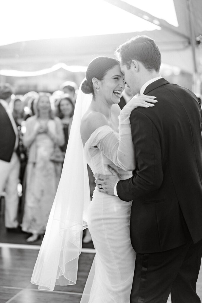 Bride and groom share an intimate moment with romantic lighting during a dance as wedding guests look on. best wedding photographers in Connecticut
best wedding photographers in New York city
best wedding photographers in tri-state area
Connecticut wedding photographer
Connecticut wedding planning
getaway wedding photographer
Litchfield county wedding photographer
Manhattan wedding planning
New York wedding photographer
travel wedding photographer
wedding day schedule
wedding day schedule template
wedding day timeline
wedding planning tips
wedding schedule template
when to start getting ready on my wedding day