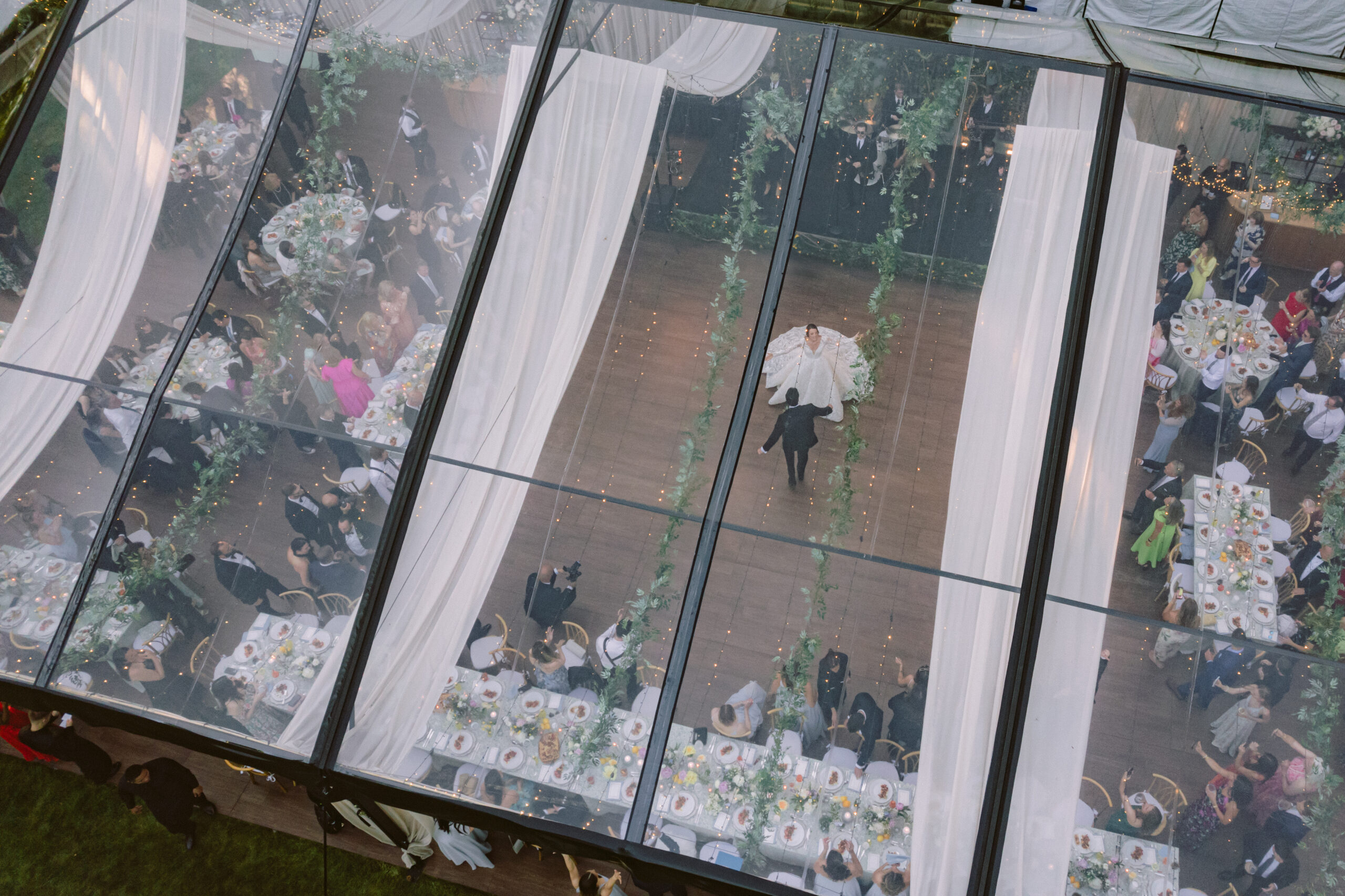 An aerial view of a bride and groom's first dance through a clear-top tent. best wedding photographers in Connecticut
best wedding photographers in New York city
best wedding photographers in tri-state area
Connecticut wedding photographer
Connecticut wedding planning
getaway wedding photographer
Litchfield county wedding photographer
Manhattan wedding planning
New York wedding photographer
travel wedding photographer
wedding day schedule
wedding day schedule template
wedding day timeline
wedding planning tips
wedding schedule template
when to start getting ready on my wedding day