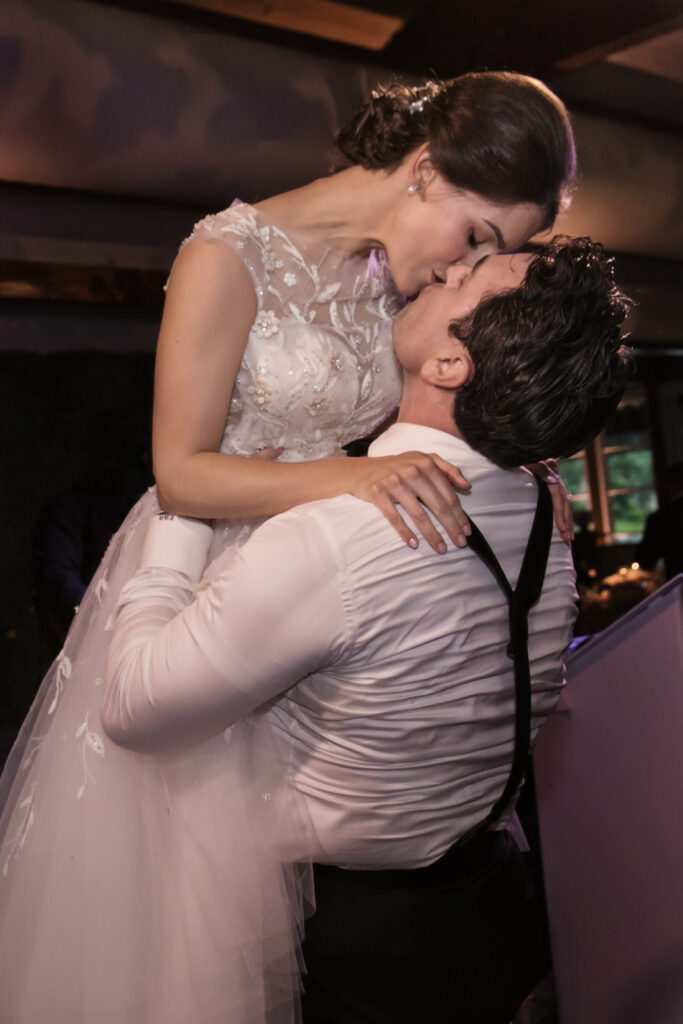 A groom lifts his bride for a kiss during their wedding reception. best wedding photographers in Connecticut
best wedding photographers in New York city
best wedding photographers in tri-state area
Connecticut wedding photographer
Connecticut wedding planning
getaway wedding photographer
Litchfield county wedding photographer
Manhattan wedding planning
New York wedding photographer
travel wedding photographer
wedding day schedule
wedding day schedule template
wedding day timeline
wedding planning tips
wedding schedule template
when to start getting ready on my wedding day