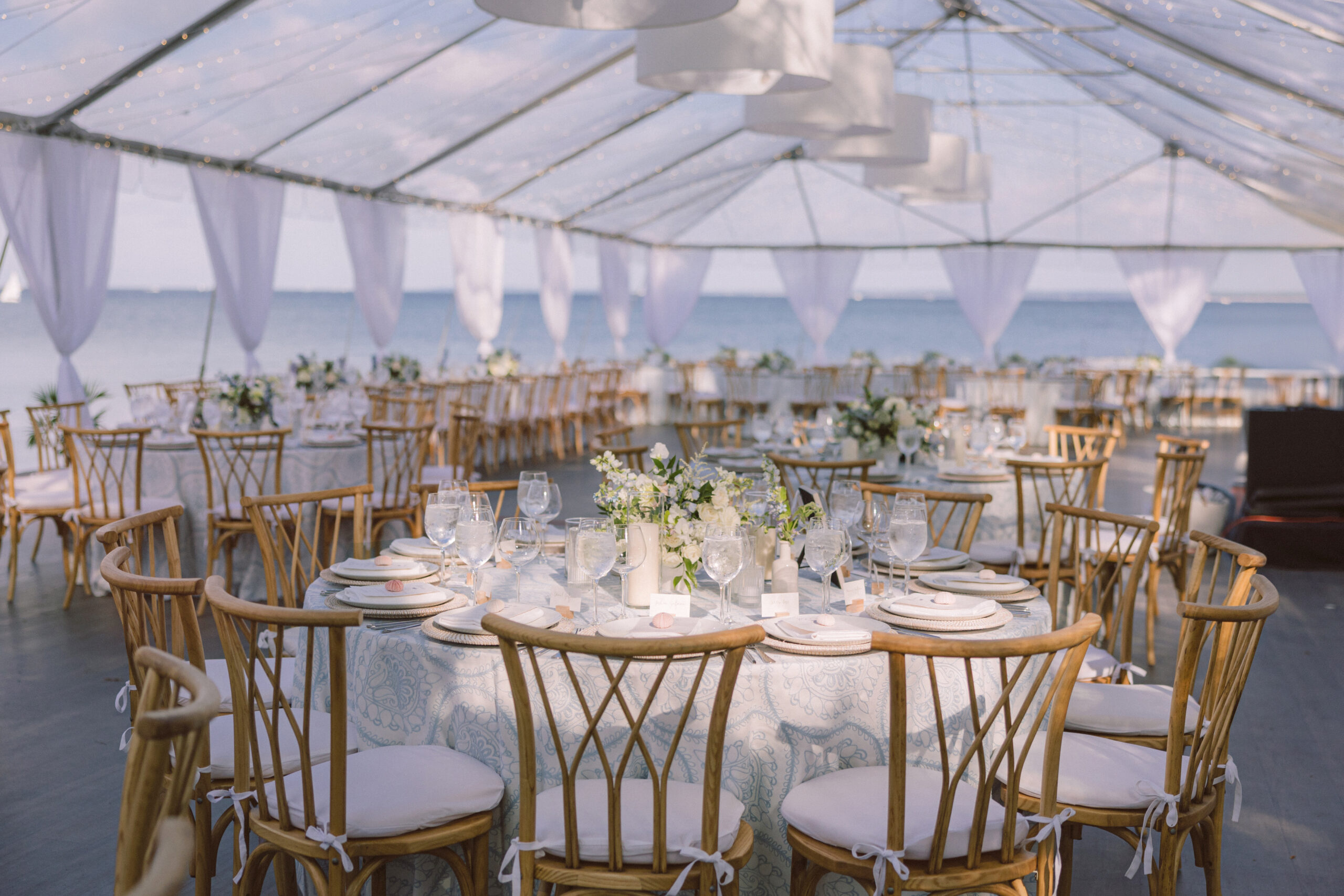 Airy wedding dinner table arrangements and decorations in a waterfront clear tent. best wedding photographers in Connecticut
best wedding photographers in New York city
best wedding photographers in tri-state area
Connecticut wedding photographer
Connecticut wedding planning
getaway wedding photographer
Litchfield county wedding photographer
Manhattan wedding planning
New York wedding photographer
travel wedding photographer
wedding day schedule
wedding day schedule template
wedding day timeline
wedding planning tips
wedding schedule template
when to start getting ready on my wedding day