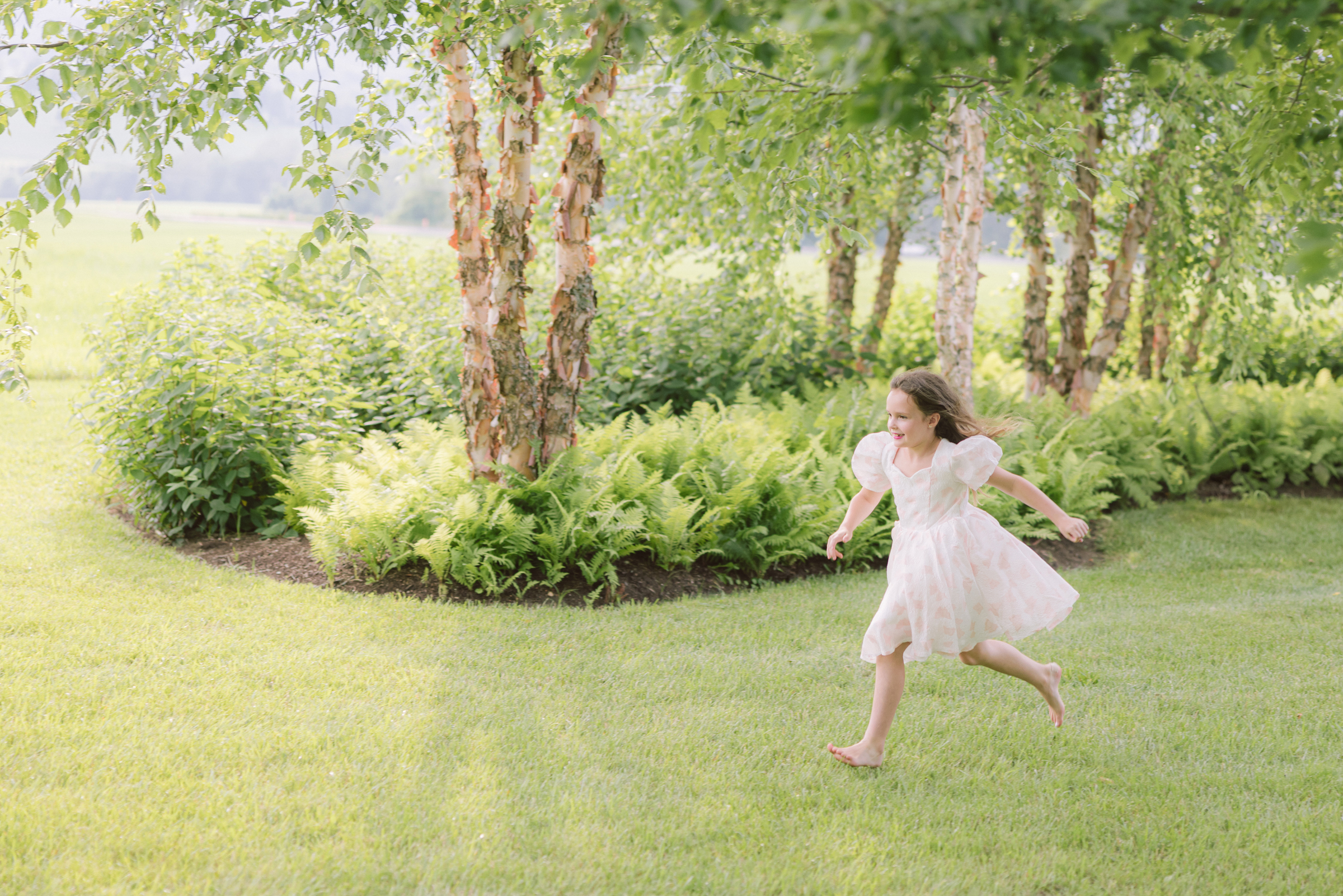 Flower Girl Running Across Field at LionRock Farm