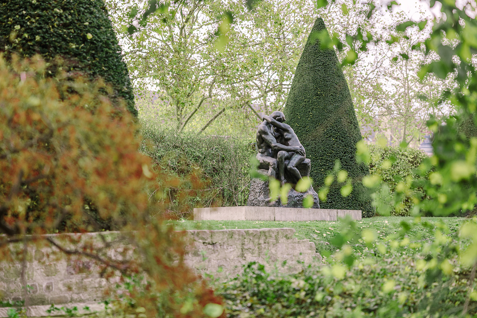 Rodin Sculpture The Kiss in Gardens of Musée Rodin in Paris During Fall