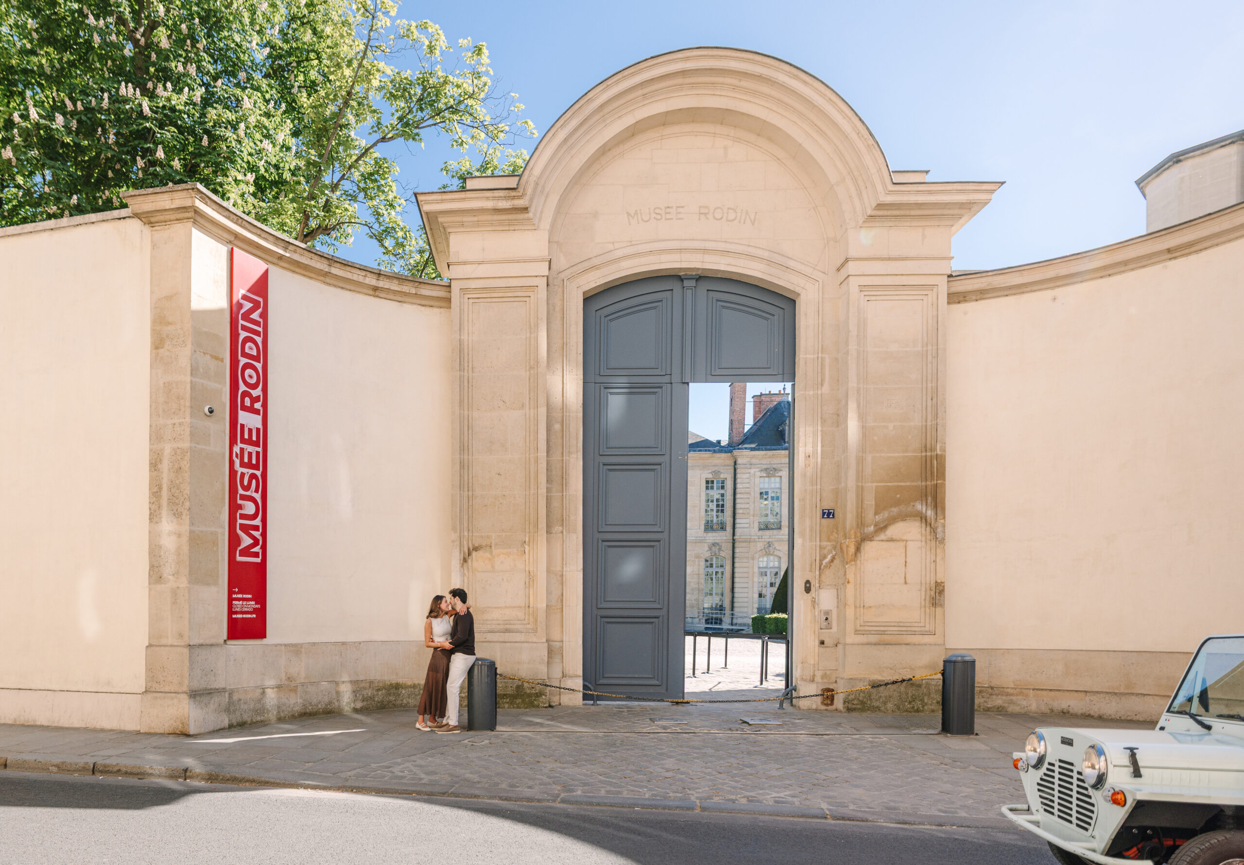 Entrance to Musée Rodin in Paris with Couple Kissing Under Portico