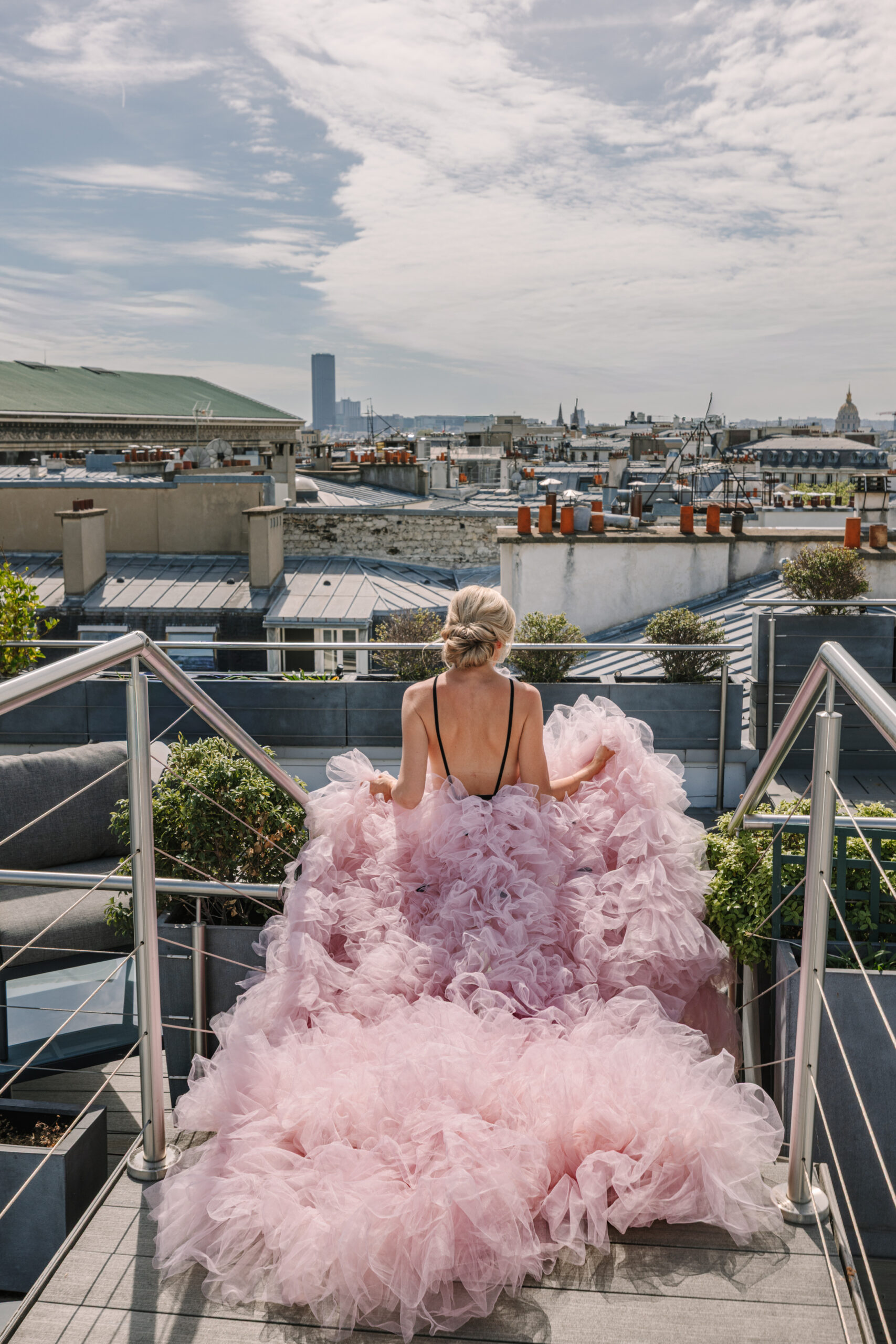 Dramatic Blush Tulle Dress Worn by Bride to be During Paris Engagement Photos, paris rooftop