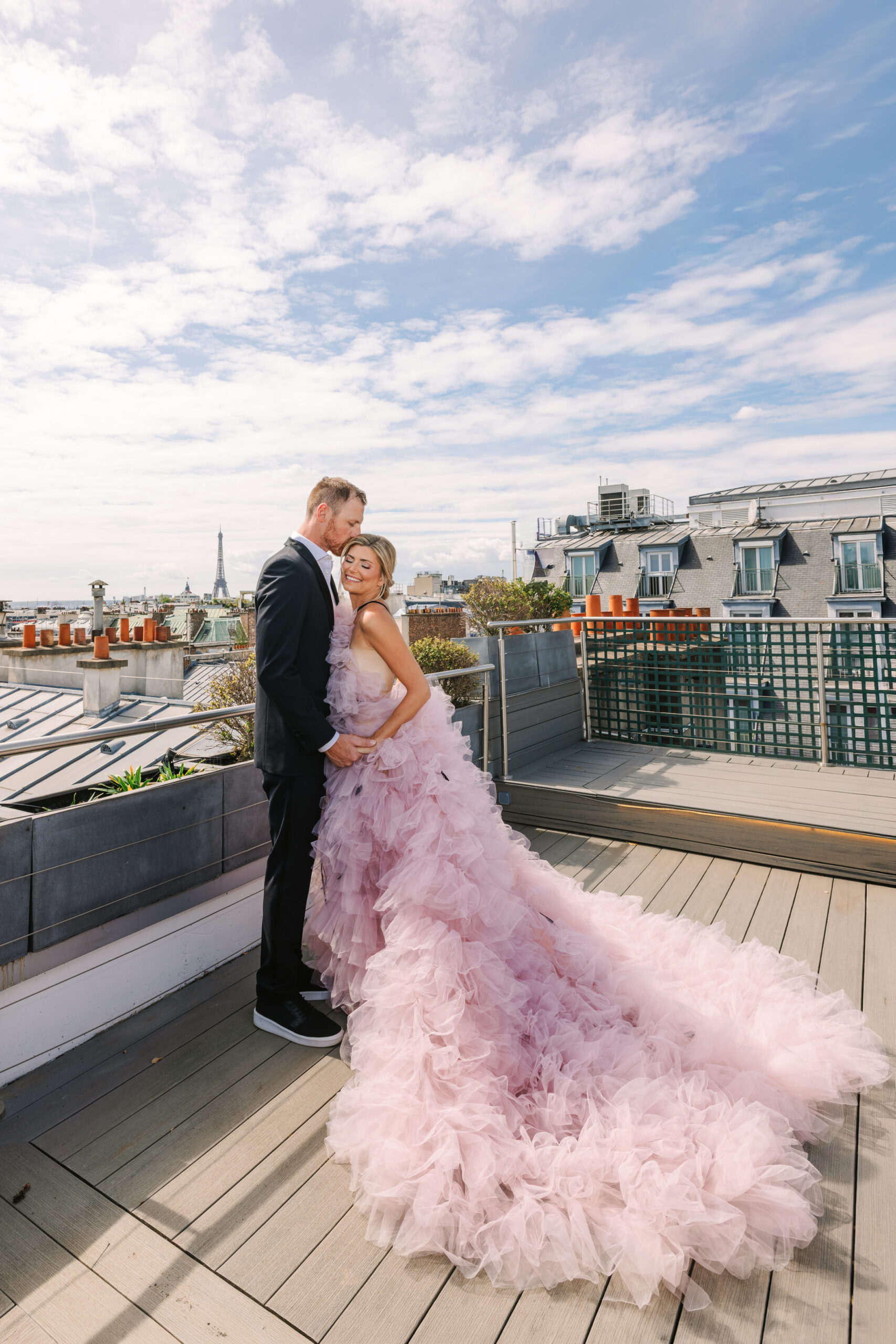 Engaged Copule Embraces on Rooftop of Hôtel Alfred Sommier, During Photoshoot, paris rooftop