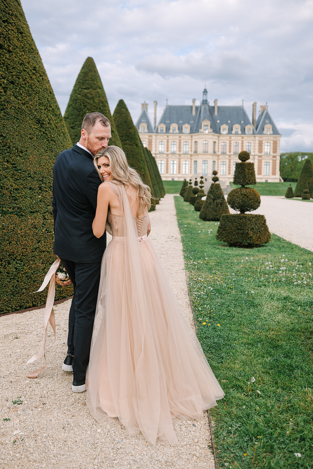 Couple Walk in Gardens of Château de Sceaux, with Facade of Chateau in Background